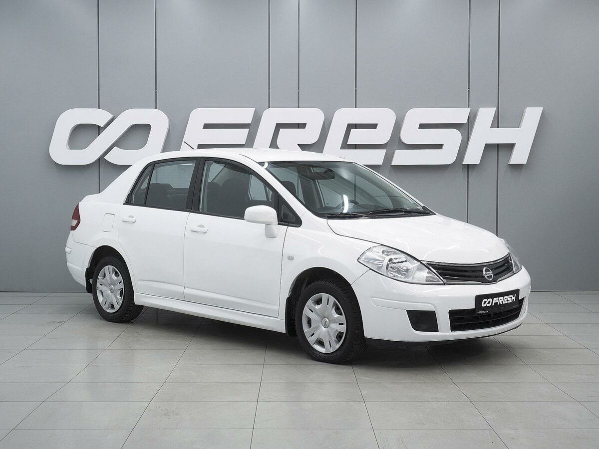 Открыть фотографии: Nissan Tiida I Рестайлинг