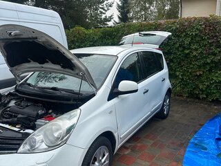 2011 Nissan Note I Рестайлинг, белый, 670000 рублей, вид 2