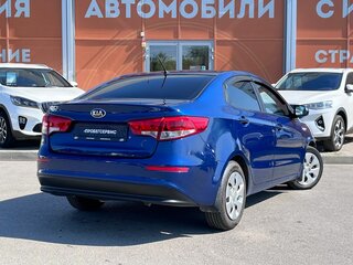 2015 Kia Rio 6-speed III, синий, 845000 рублей, вид 5