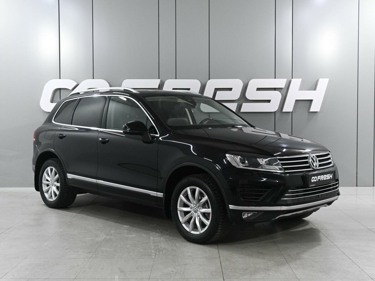 Открыть фотографии: Volkswagen Touareg II Рестайлинг