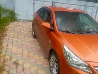 2015 Hyundai Solaris I Рестайлинг, оранжевый, 650000 рублей, вид 5