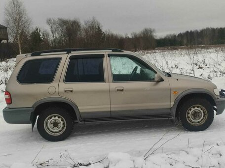 2005 Kia Sportage Grand I, коричневый, 370000 рублей, вид 3