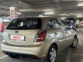 2010 Kia Rio II Рестайлинг, золотистый, 595000 рублей - вид 3