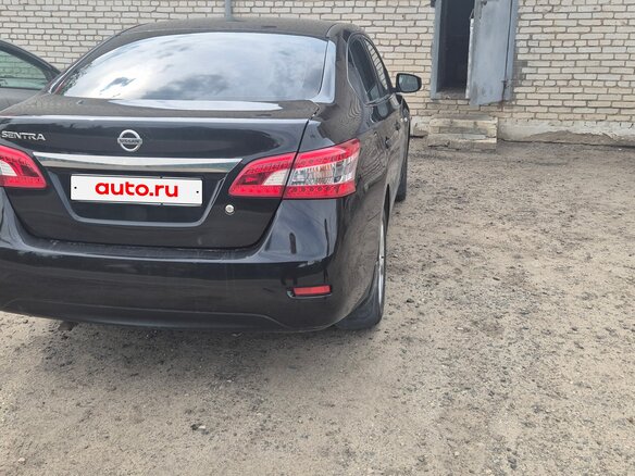 2014 Nissan Sentra VII (B17), чёрный - вид 1
