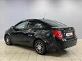 2012 Chevrolet Aveo II, чёрный, 470000 рублей - вид 4
