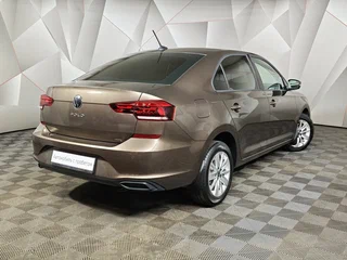2021 Volkswagen Polo VI, коричневый, 1595000 рублей, вид 2