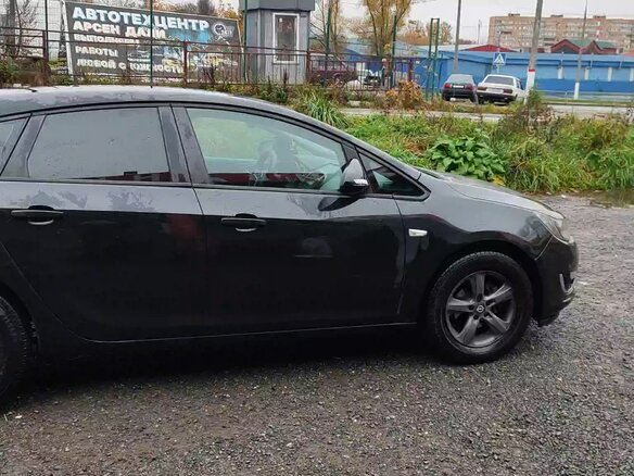 2012 Opel Astra J Рестайлинг, чёрный, 750000 рублей - вид 13