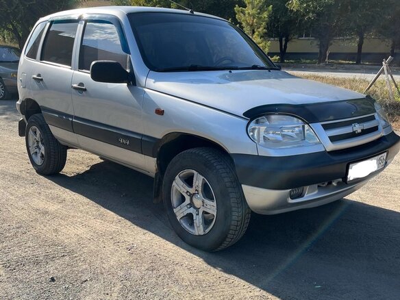 2004 Chevrolet Niva I, серебристый - вид 2