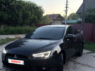2013 Mitsubishi Lancer X Рестайлинг, чёрный, 890000 рублей, вид 1