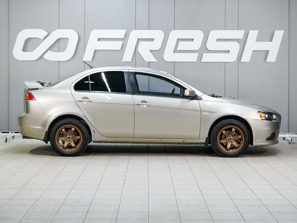 2011 Mitsubishi Lancer X Рестайлинг, бежевый, 461000 рублей - вид 4