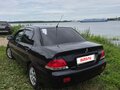 2007 Mitsubishi Lancer IX, чёрный, 420000 рублей - вид 1