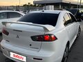 2008 Mitsubishi Lancer X, белый, 585000 рублей - вид 3