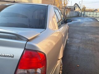 2003 Mazda Familia VIII (BJ), серый, 164000 рублей, вид 3