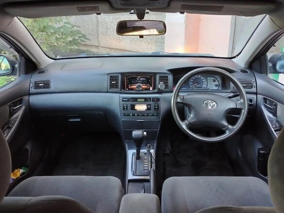 2003 Toyota Corolla Fielder IX (E120, E130), чёрный, 425000 рублей - вид 8