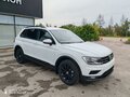 2017 Volkswagen Tiguan II, белый - вид 2
