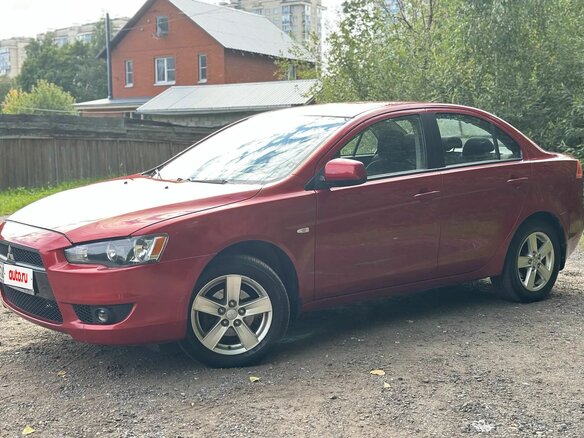 2008 Mitsubishi Lancer X, красный - вид 2