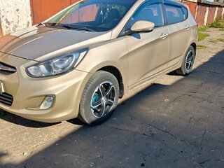 2011 Hyundai Solaris I, бежевый, 620000 рублей, вид 1