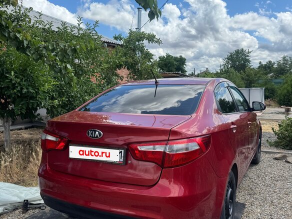 2014 Kia Rio III, красный, 650000 рублей - вид 4