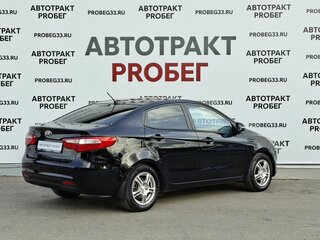 2013 Kia Rio 5-speed III, чёрный, 793000 рублей, вид 5