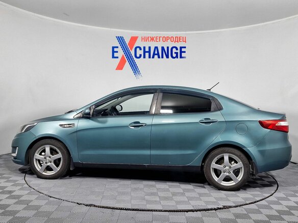 2011 Kia Rio 4-speed III, зелёный - вид 4