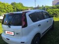 2011 Nissan Note I Рестайлинг, белый, 700000 рублей - вид 3