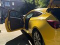 2014 Opel Astra GTC J Рестайлинг, жёлтый - вид 6