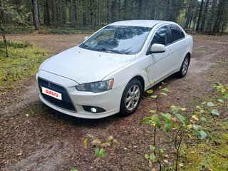 2011 Mitsubishi Lancer X Рестайлинг, белый, 640000 рублей, вид 1