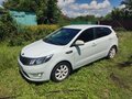 2014 Kia Rio 4-speed III, белый, 910000 рублей