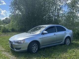 2009 Mitsubishi Lancer X, серебристый, 585000 рублей, вид 2