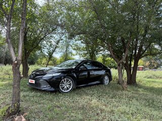 2021 Toyota Camry VIII (XV70), чёрный, 2800000 рублей, вид 1