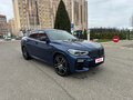 2021 BMW X6 40d III (G06), синий, 9500000 рублей - вид 3