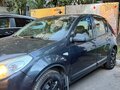 2010 Renault Sandero I, серый - вид 2