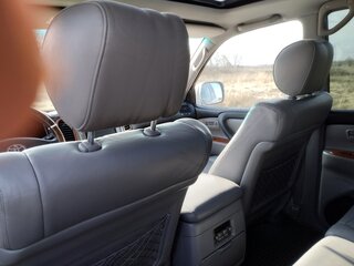 2003 Toyota Land Cruiser Cygnus 100 Series Рестайлинг 1, серый, 2000020 рублей, вид 4