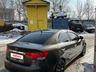 2011 Kia Cerato 6-speed II, золотистый, 680000 рублей, вид 5