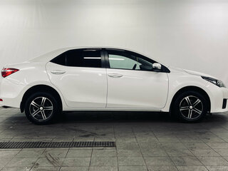 2014 Toyota Corolla XI (E160, E170, E180), белый, 1030000 рублей, вид 3
