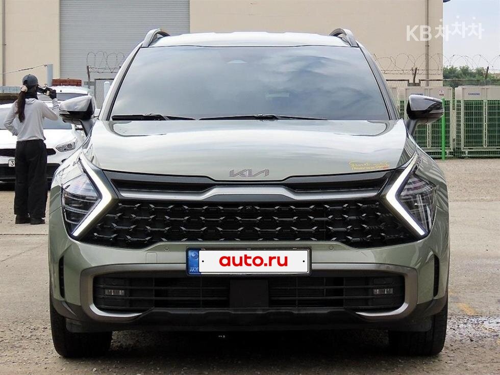 Открыть фотографии: Kia Sportage V