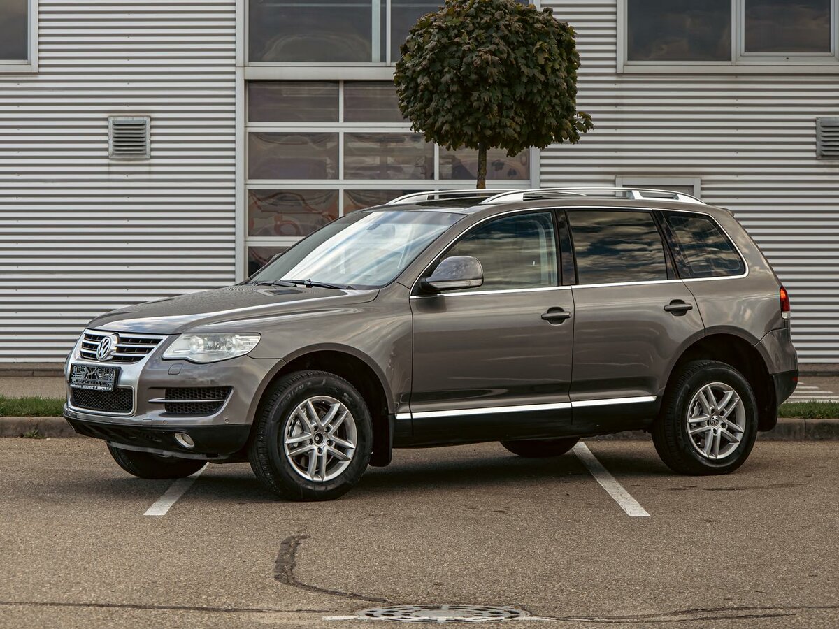 Открыть фотографии: Volkswagen Touareg I Рестайлинг