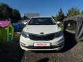 2015 Kia Rio III Рестайлинг, белый, 750000 рублей - вид 1