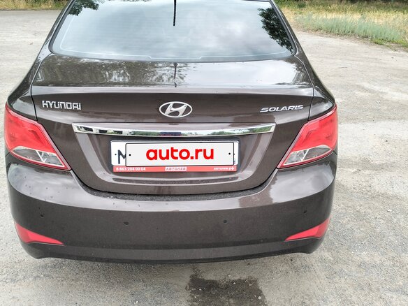 2014 Hyundai Solaris I Рестайлинг, коричневый, 1100000 рублей - вид 1