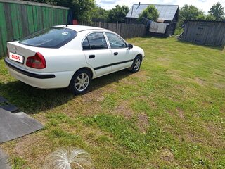 2003 Mitsubishi Carisma I Рестайлинг, белый, 370000 рублей, вид 2