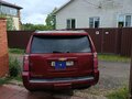 2016 Chevrolet Tahoe IV, красный, 2200000 рублей - вид 3