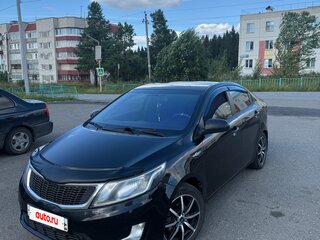 2013 Kia Rio 5-speed III, чёрный, 820000 рублей, вид 2