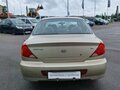 2009 Kia Spectra I Рестайлинг 2, серебристый - вид 4