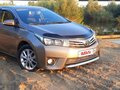 2014 Toyota Corolla XI (E160, E170, E180), золотистый, 1800000 рублей