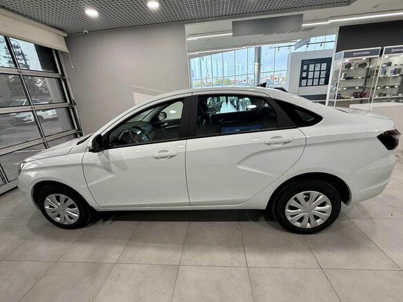 2026 Lada (ВАЗ) Vesta I Рестайлинг (NG), белый, 1669835 рублей - вид 9