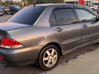 2007 Mitsubishi Lancer IX Рестайлинг, серый, 210000 рублей, вид 3