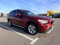 2012 BMW X1 20i I (E84), красный, 1690000 рублей - вид 2