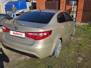 2015 Kia Rio 6-speed III, бежевый, 870000 рублей, вид 5