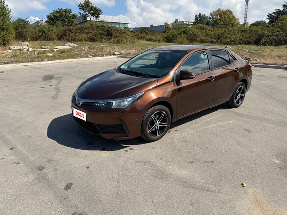 2016 Toyota Corolla XI (E160, E170, E180) Рестайлинг 1, коричневый, 1399999 рублей - вид 7