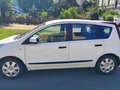 2013 Nissan Note I Рестайлинг, белый, 850000 рублей - вид 2